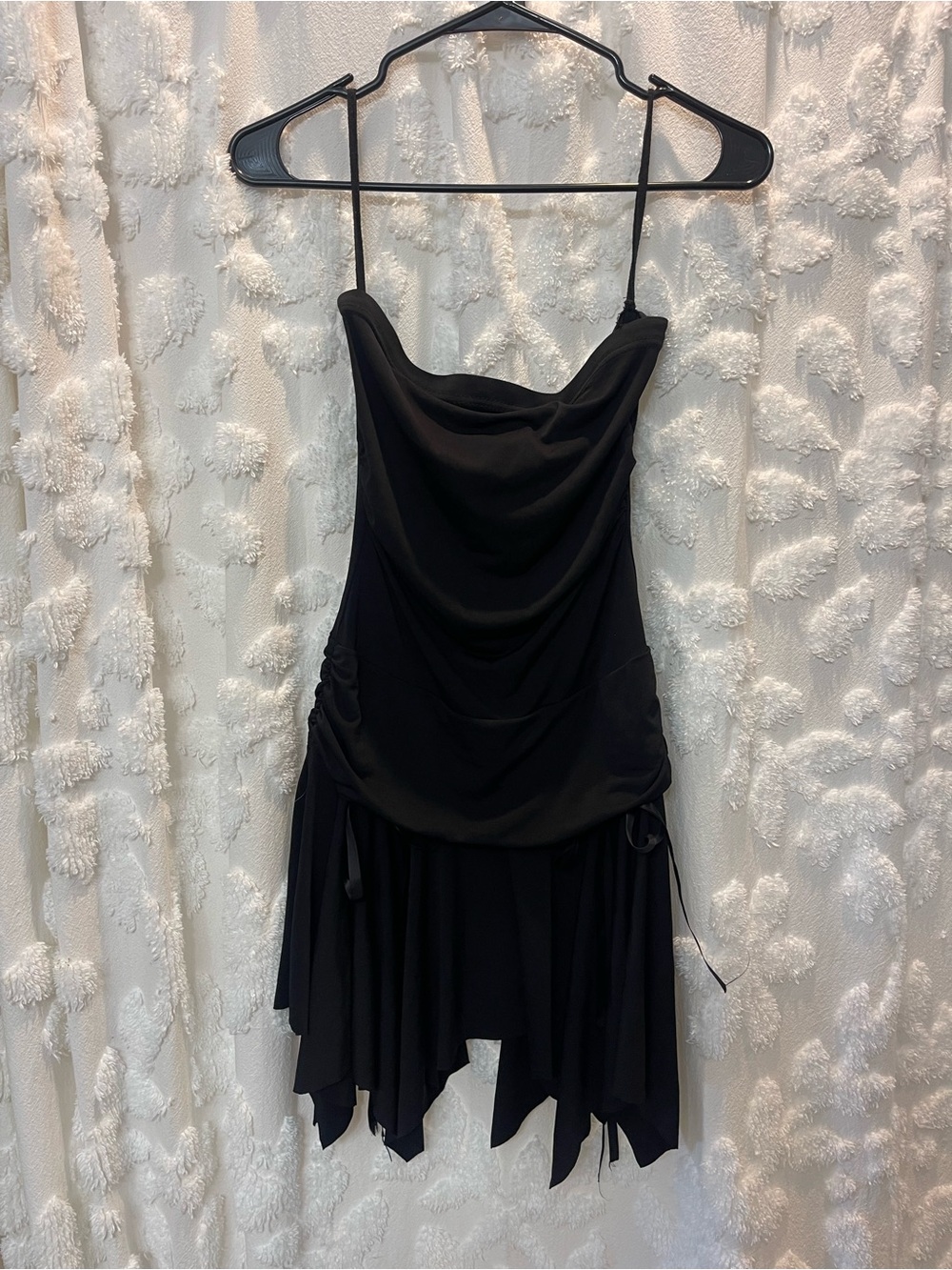 Black strapless mini dress with asymmetric hem